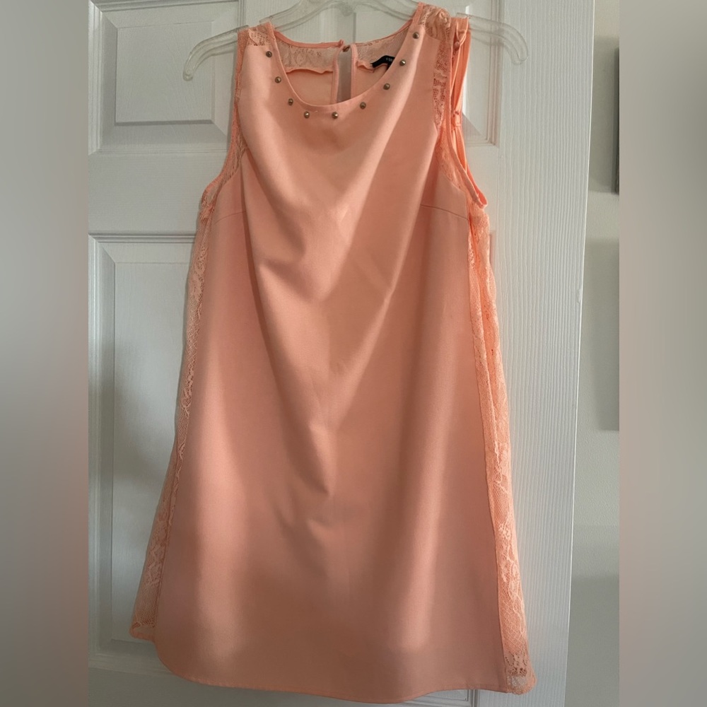 Short peach dress, great for casual events.